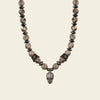 Skull Drift Necklace with round stone beads and skull-shaped accents
