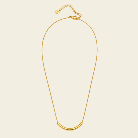 Slender Arc Necklace with a fine chain and slender curved bar in gold finish