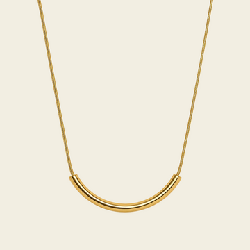 Slender Arc Necklace with a fine chain and slender curved bar in gold finish