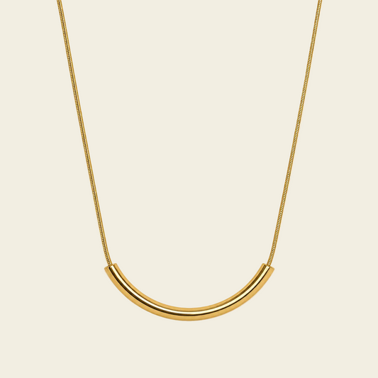 Slender Arc Necklace with a fine chain and slender curved bar in gold finish