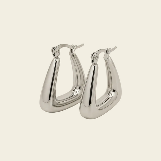 Soft Angle Earrings with polished rounded triangular hoops in silver finish