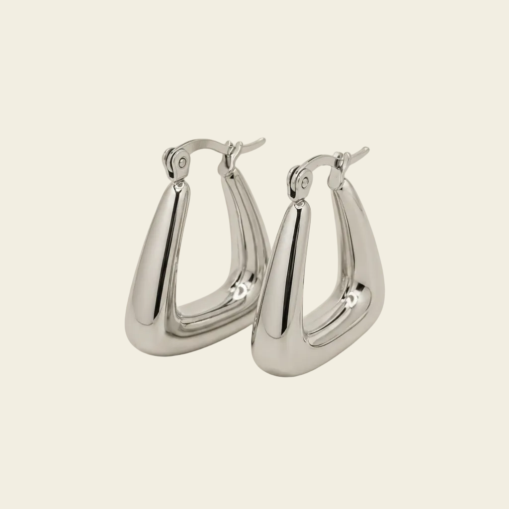 Soft Angle Earrings with polished rounded triangular hoops in silver finish
