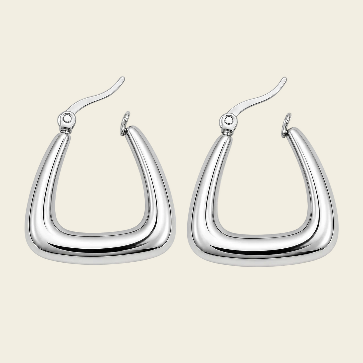 Soft Angle Earrings with polished rounded triangular hoops in silver finish