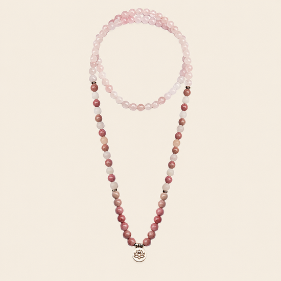 Soft Bloom Necklace with pink round stone beads and a small round charm