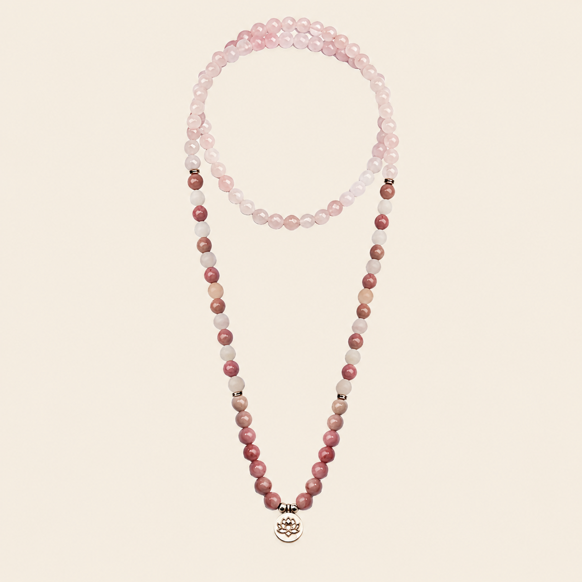Soft Bloom Necklace with pink round stone beads and a small round charm