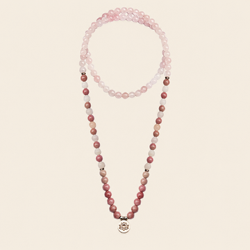 Soft Bloom Necklace with pink round stone beads and a small round charm