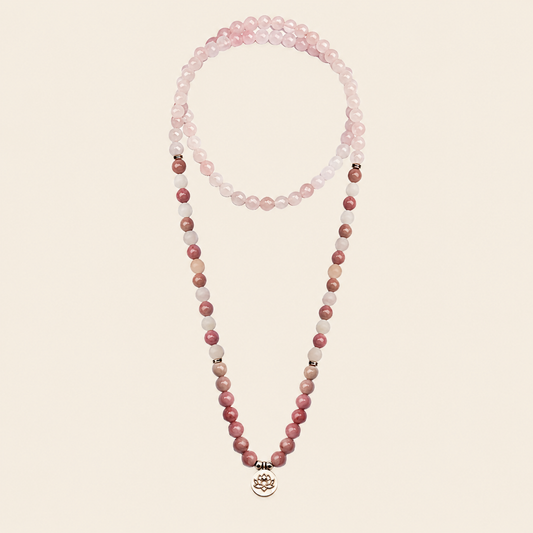 Soft Bloom Necklace with pink round stone beads and a small round charm