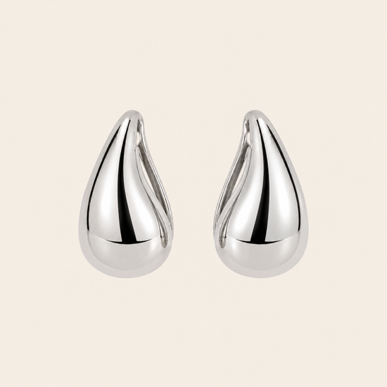 Soft Curve Earrings with polished teardrop-shaped earrings in silver finish