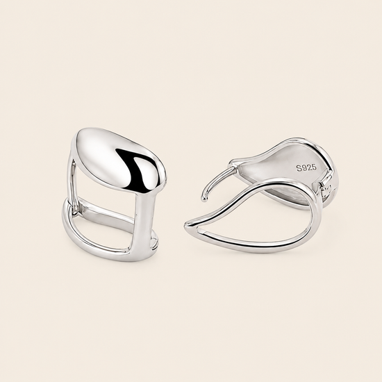 Soft Curve Earrings with polished teardrop-shaped earrings in silver finish