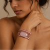 Soft Echo Bracelet worn on the wrist, with layered pink and cream beads