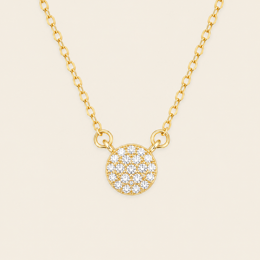 Soft Halo Necklace with a round pendant set with clear stones in gold finish