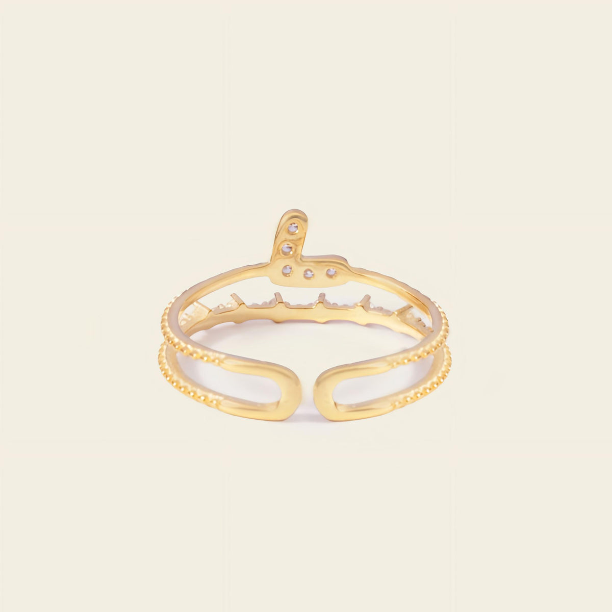 Soft Heart Ring with an open heart-shaped band with clear accents in gold finish