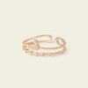 Soft Heart Ring with an open heart-shaped band with clear accents in gold finish