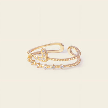 Soft Heart Ring with an open heart-shaped band with clear accents in gold finish