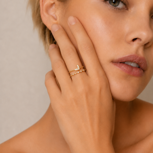 Soft Heart Ring worn on the hand in gold finish