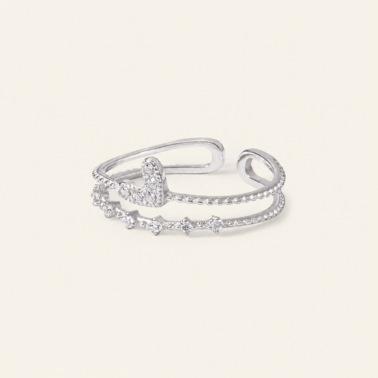 Soft Heart Ring with an open heart-shaped band with clear accents in silver finish