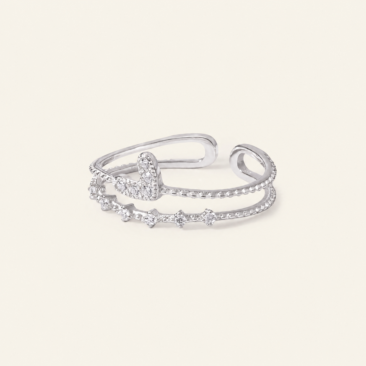 Soft Heart Ring with an open heart-shaped band with clear accents in silver finish
