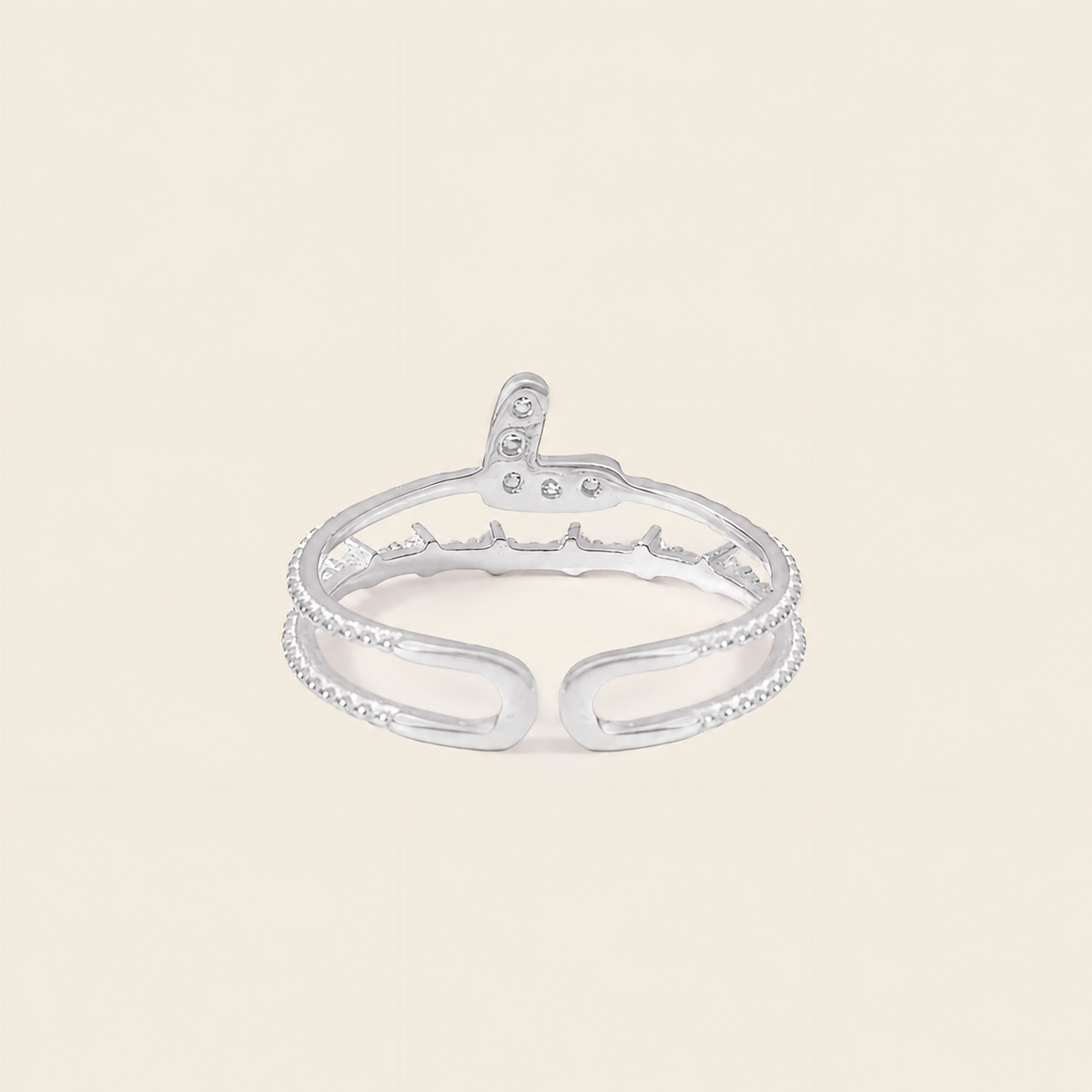 Soft Heart Ring with an open heart-shaped band with clear accents in silver finish
