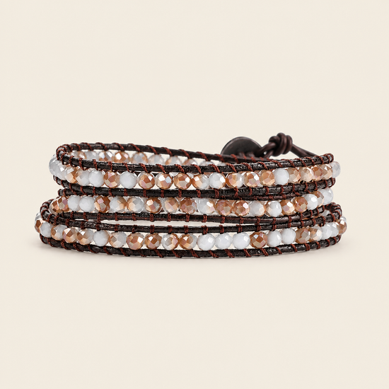 Soft Rhythm Bracelet with pale faceted beads woven onto dark cord