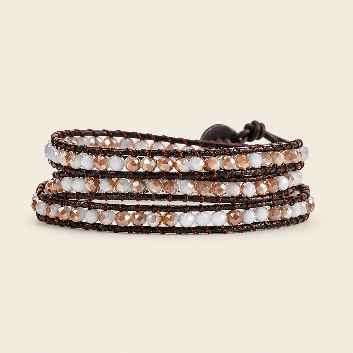 Soft Rhythm Bracelet with pale faceted beads woven onto dark cord