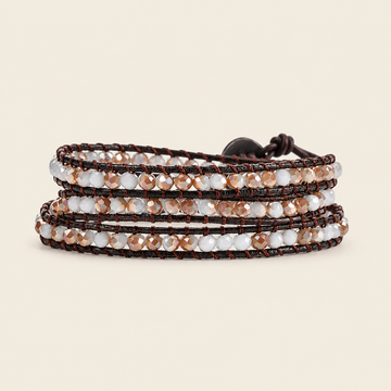Soft Rhythm Bracelet with pale faceted beads woven onto dark cord