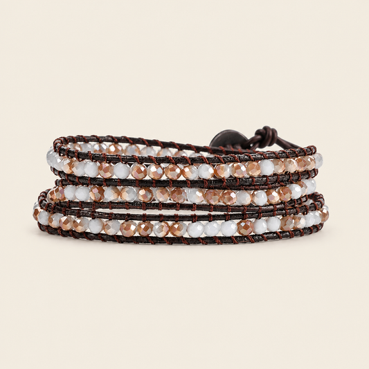 Soft Rhythm Bracelet with pale faceted beads woven onto dark cord
