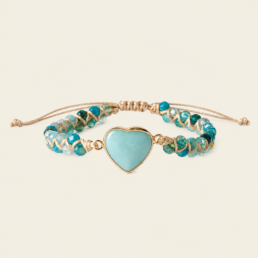 Soft Signal Bracelet with turquoise-coloured beads and a pale heart centre