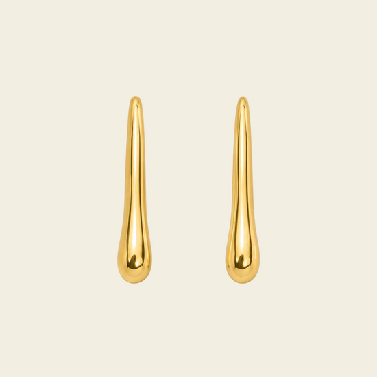 Soft Taper Earrings with slender tapered drops with rounded ends in gold finish