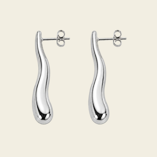 Soft Taper Earrings with slender tapered drops with rounded ends in silver finish