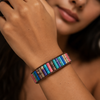 Spectrum Tile Bracelet worn on the wrist, with bright multicoloured rectangular beads