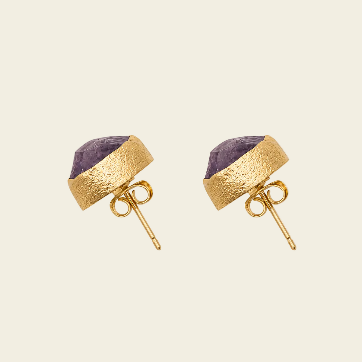 Still Core Earrings with irregular purple stone studs with gold-coloured edges