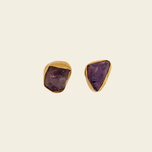 Still Core Earrings with irregular purple stone studs with gold-coloured edges