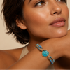 Stillwater Heart Bracelet worn on the wrist, with round stone beads and a heart-shaped centre