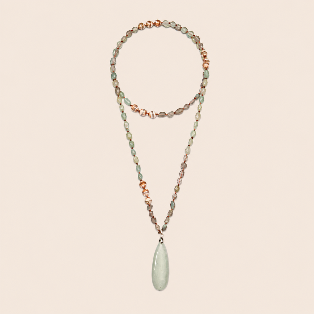 Stillwater Thread Necklace with pale beads and an elongated pale pendant