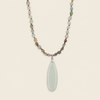 Stillwater Thread Necklace with pale beads and an elongated pale pendant
