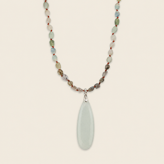 Stillwater Thread Necklace with pale beads and an elongated pale pendant