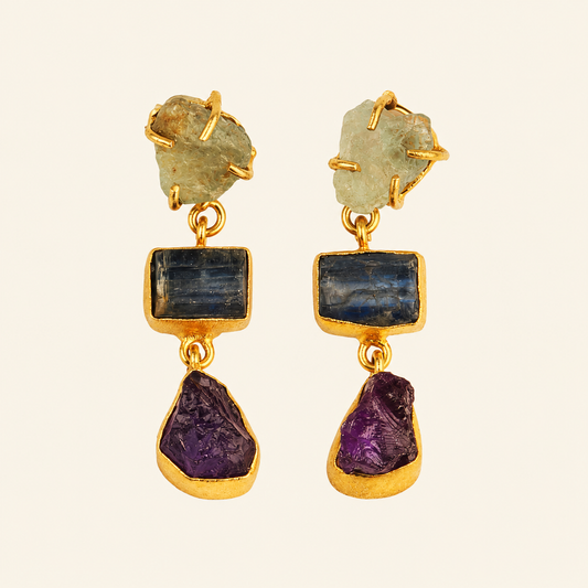 Stone Alignment Earrings with a vertical arrangement of pale, blue and purple stones