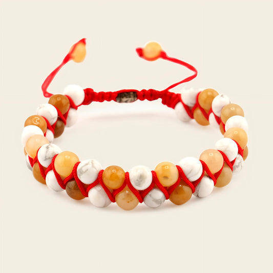 Stone Rhythm Bracelet with round beads woven onto an adjustable cord