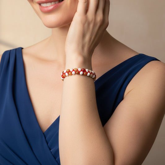 Stone Rhythm Bracelet worn on the wrist, with round beads woven onto an adjustable cord