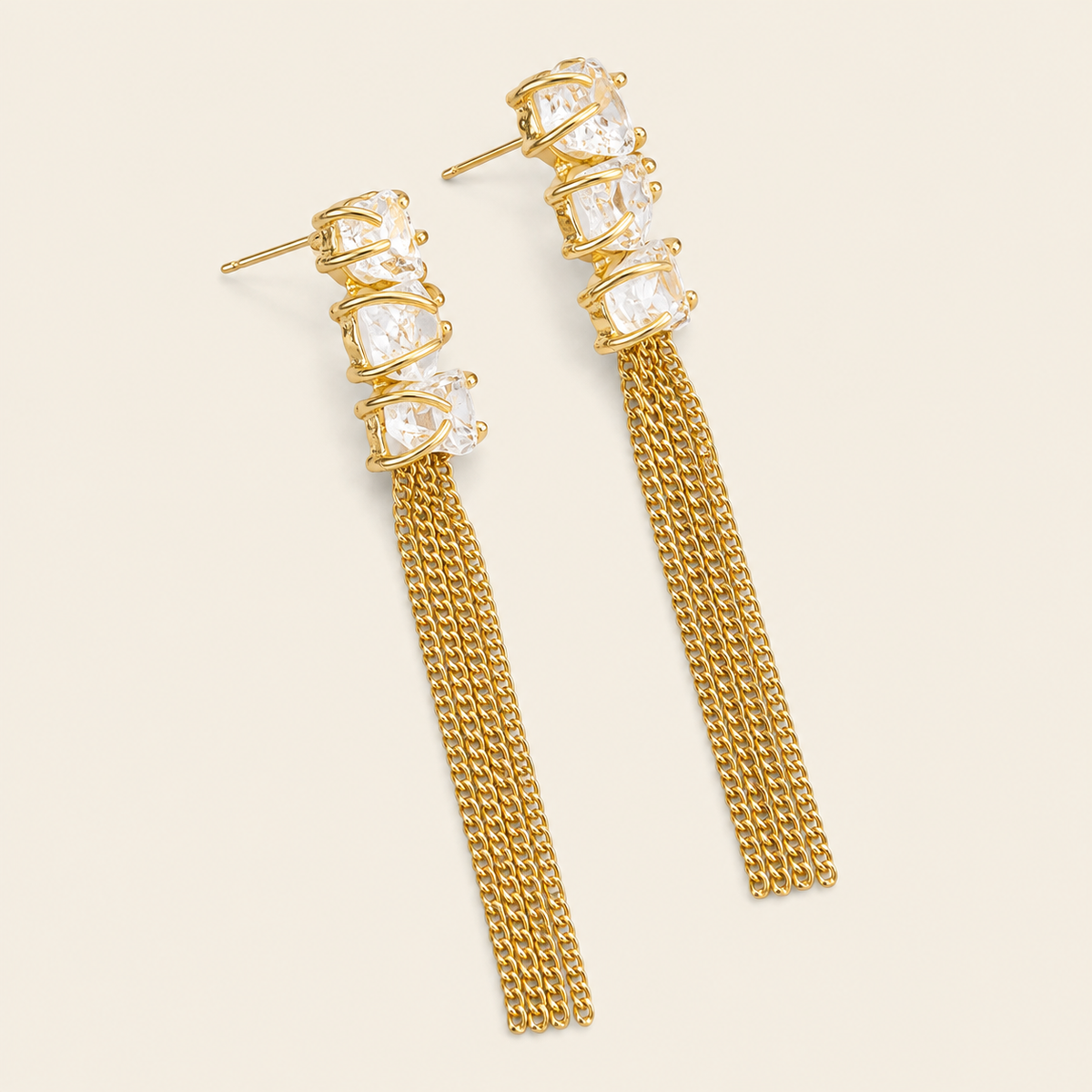 Sunlit Tassel Earrings with pale stone tops and long gold-coloured chain tassels