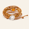 Sunlit Weave Bracelet with layered yellow and earth-toned bead strands