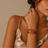 Sunset Jasper Bracelet worn on the wrist, with layered red and turquoise-coloured beads