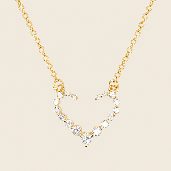 Tender Heart Necklace with an open heart pendant with clear accents in gold finish