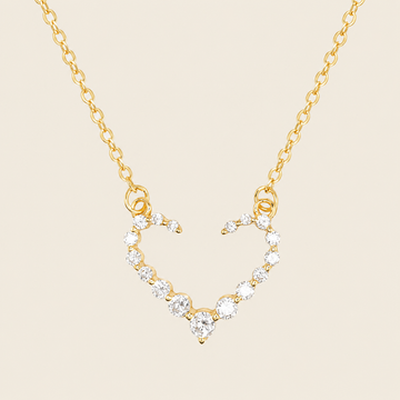 Tender Heart Necklace with an open heart pendant with clear accents in gold finish