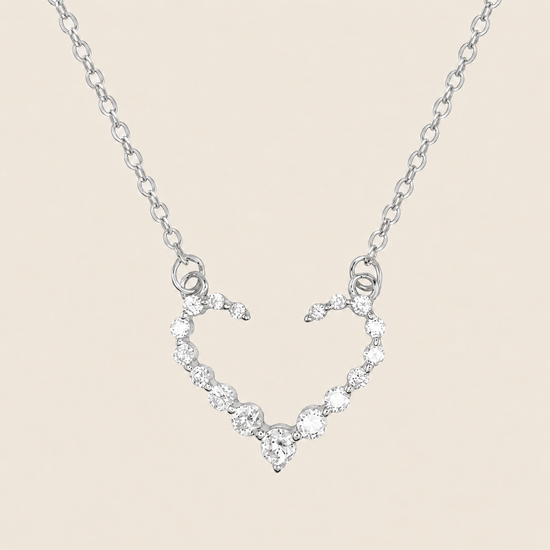 Tender Heart Necklace with an open heart pendant with clear accents in silver finish