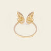 Tender Wing Ring with an open butterfly-wing design in gold finish