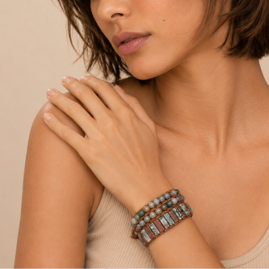 Terra Tile Bracelet worn on the wrist, with green and red stone tiles with round beads