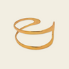 Twin Arc Cuff with two sweeping open bands and sculptural ends in gold finish