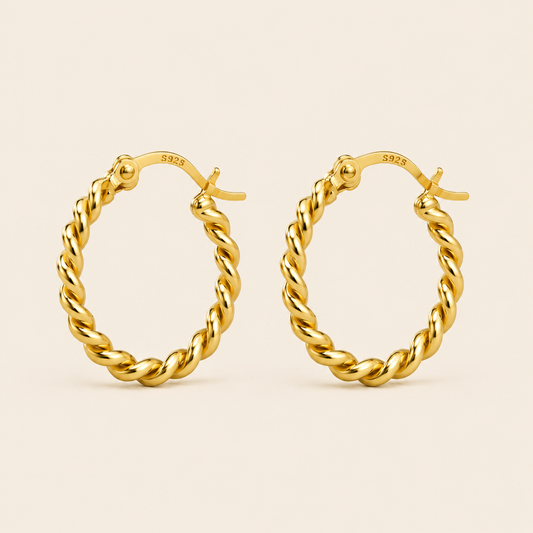 Twist Arc Earrings with twisted rope-textured hoops in gold finish