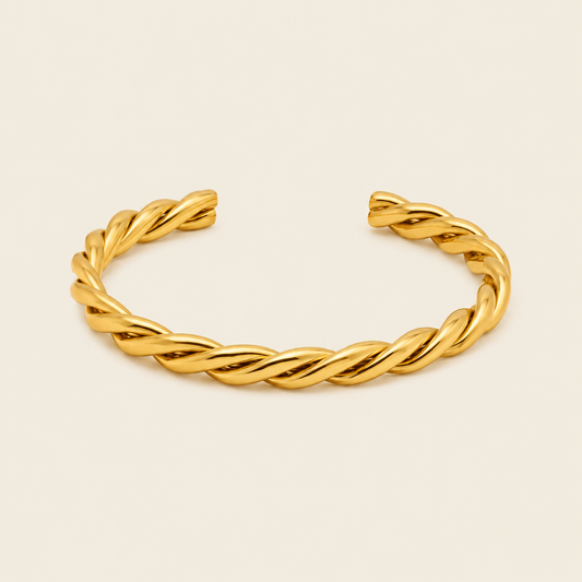 Twisted Strand Cuff with a twisted rope-shaped open band in gold finish